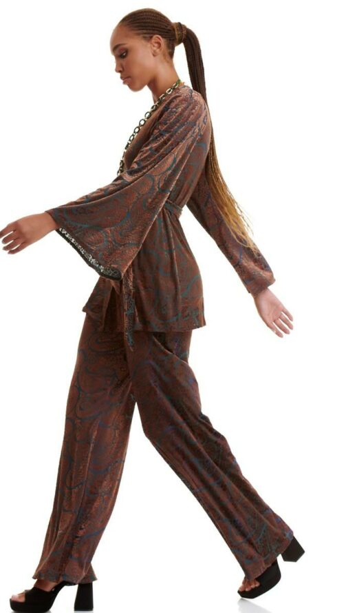 Ψηλόμεση βελουτέ ημιδιάφανη παντελόνα με λάστιχο. Στο πλάι