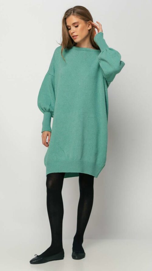 Κοντό πλεκτό βεραμάν φόρεμα με αποσπώμενη μαύρη κορδέλα στην πλάτη. Εμφάνιση από μπροστά