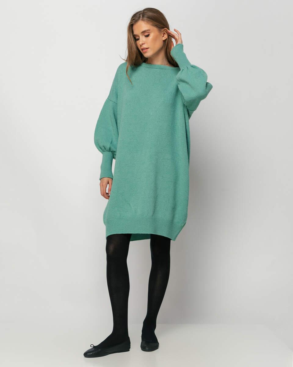 Κοντό πλεκτό βεραμάν φόρεμα με αποσπώμενη μαύρη κορδέλα στην πλάτη. Εμφάνιση από μπροστά