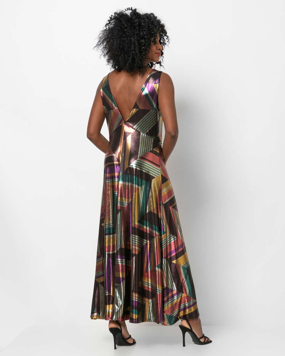 Μακρύ εμπριμέ metallic φόρεμα από πίσω