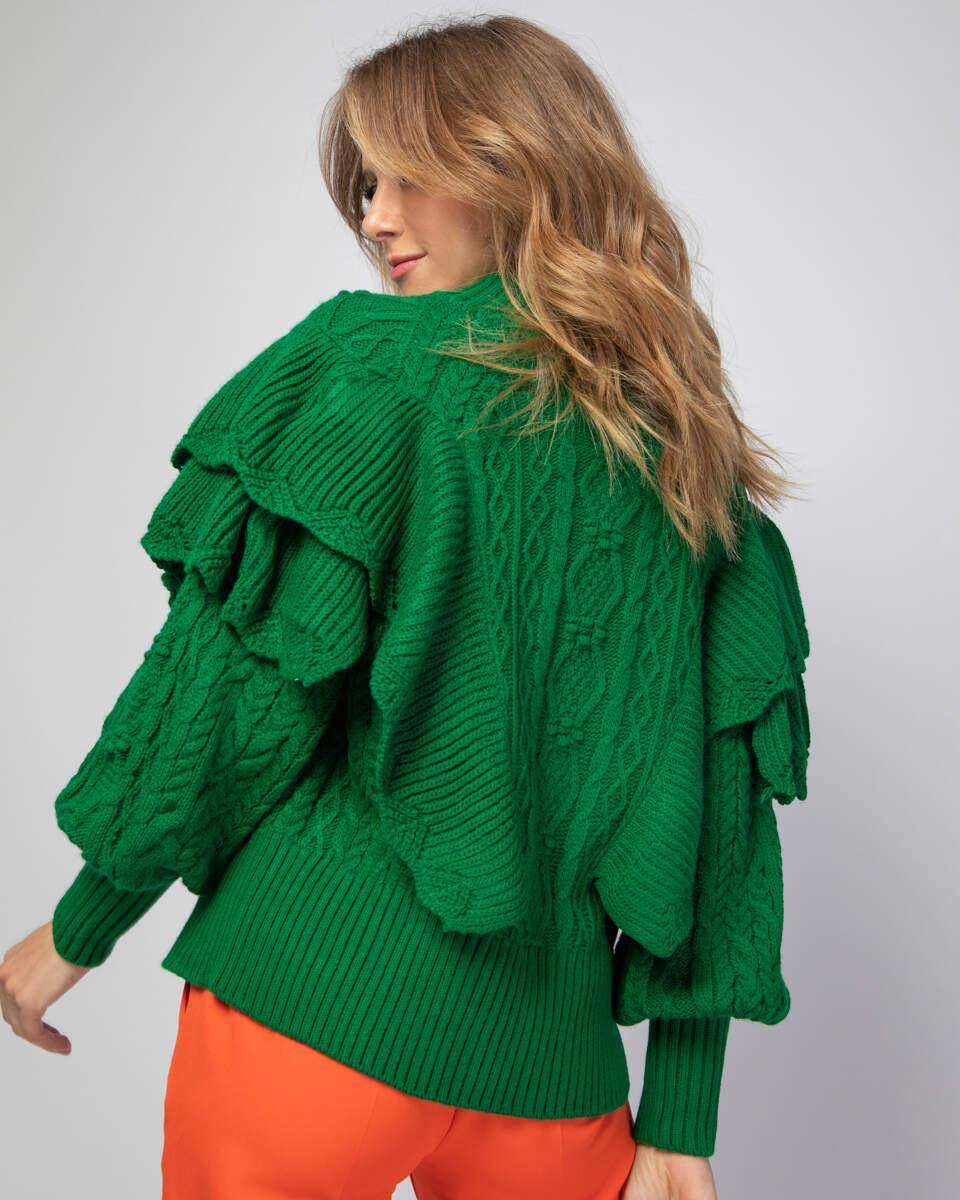 Πλεκτή πράσινη ζακέτα με φερμουάρ και fancy βολάν. Εμφάνιση από πίσω