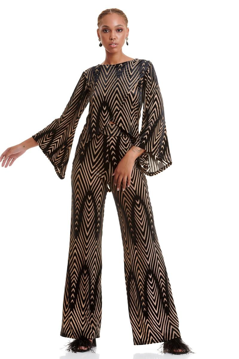 Ψηλόμεση ημιδιάφανη παντελόνα με λάστιχο στη μέση. Εμφάνιση μπροστά